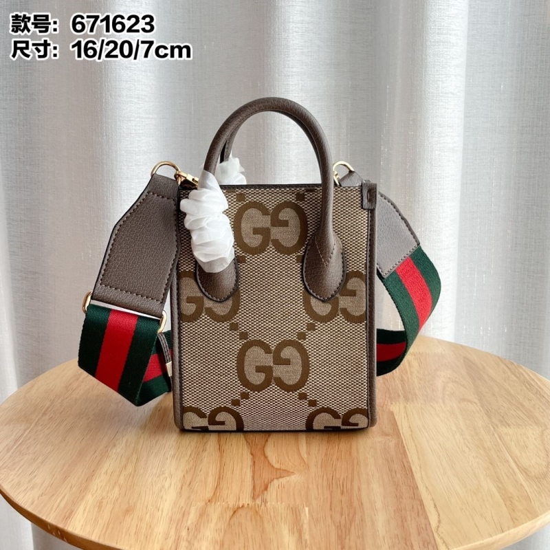 G*u*i top handle bags
